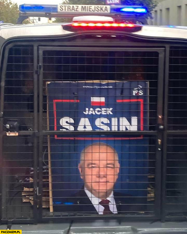 Jacek Sasin za kratami aresztowany plakat transparent straż miejska